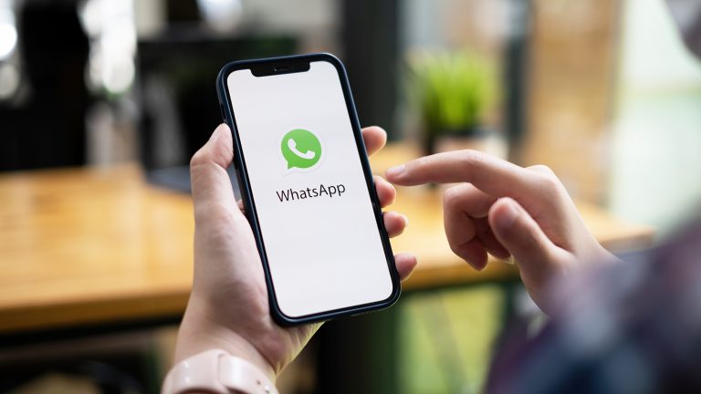 Where are WhatsApp photos stored on iPhone